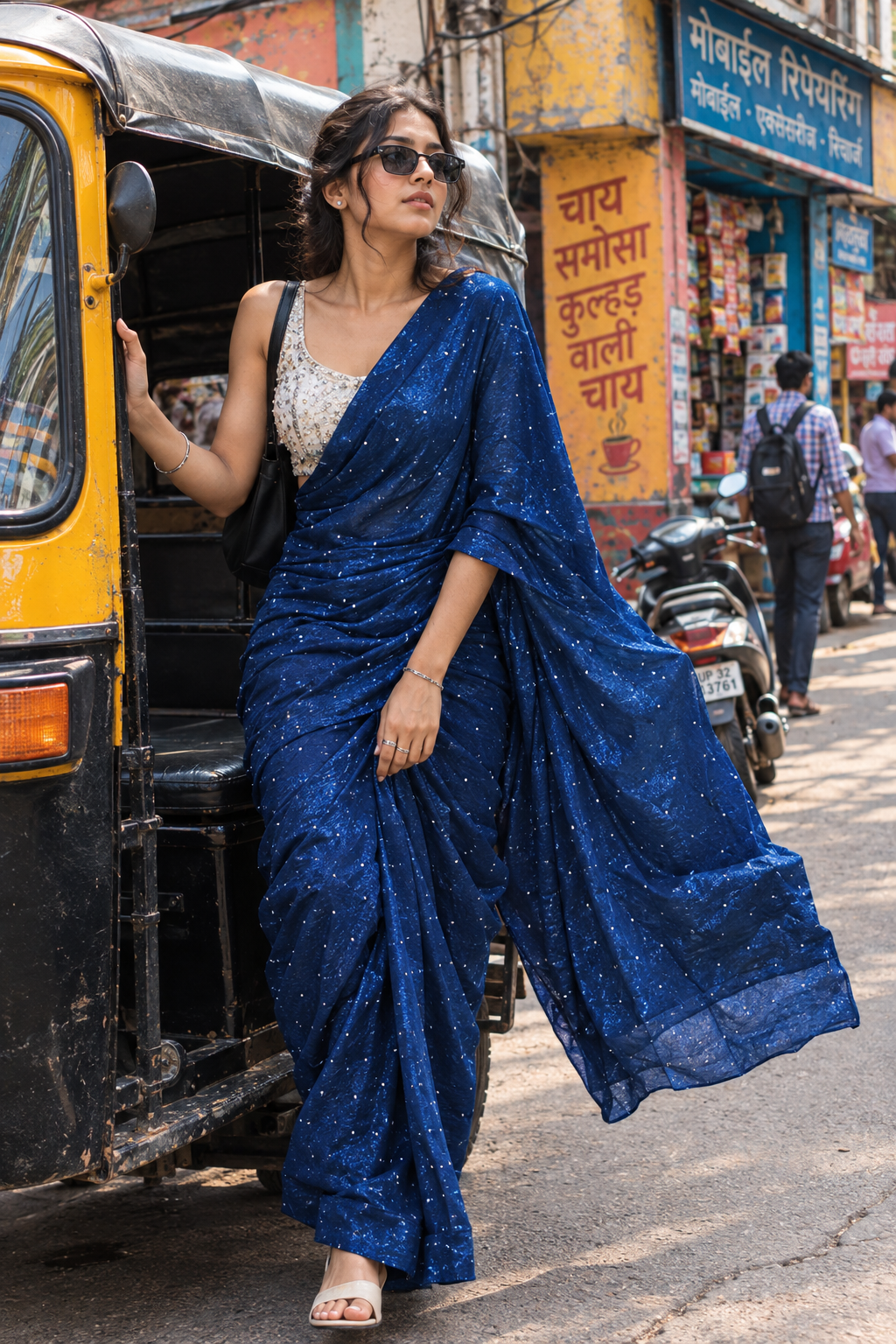 Royal blue party wear zircon saree with silver embellished work